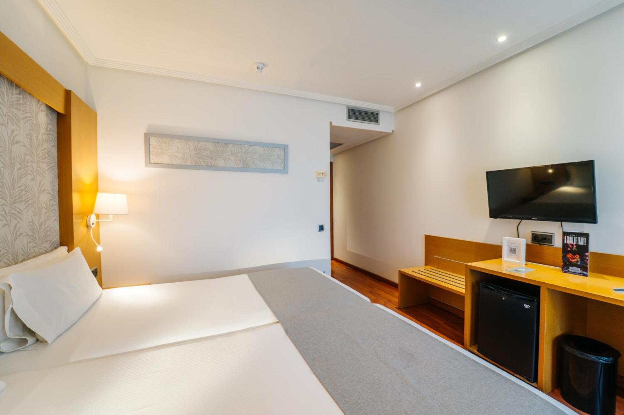 Habitación Doble (1 adulto + 1 niño)